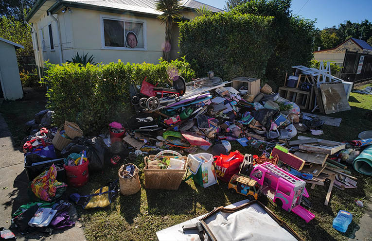 Police warn against looting in flood-stricken towns