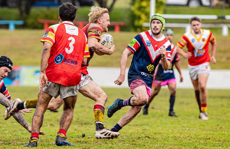 Coffs Comets Reserve Grade player Arthur Wilkinson on the attack in their Round 13 clash against the Nambucca Roosters last weekend.