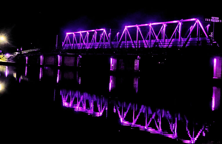 Macksville bridge lights up purple for International Overdose Awareness Day