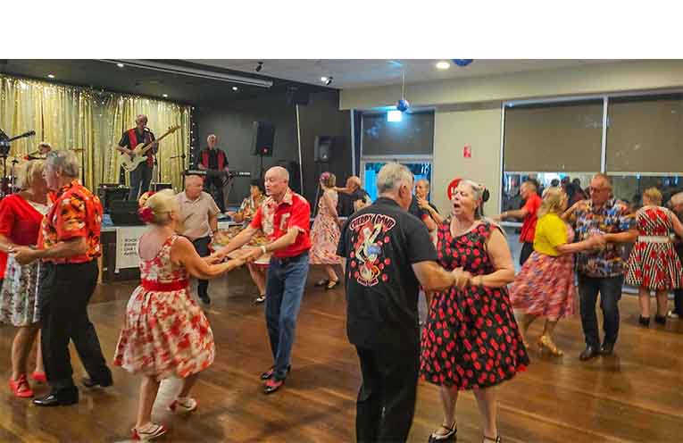 Dancers rocking out to the sounds of Buddy Love and The Tremors.
