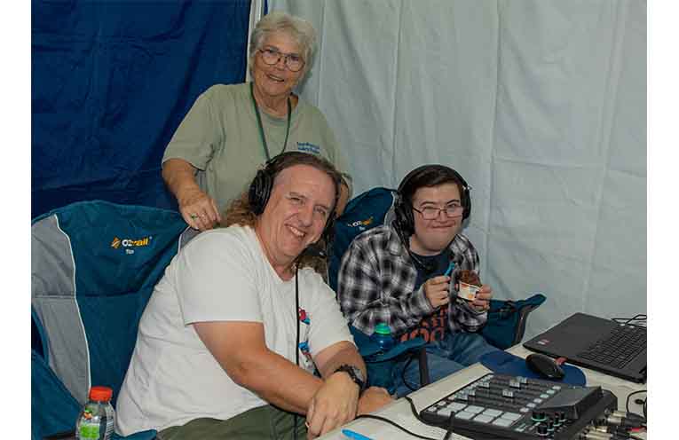 Nambucca Valley Radio’s Donna Collins with announcers Jake and the Fatman broadcast live from the Open Streets Festival. Photo: Mick Birtles.