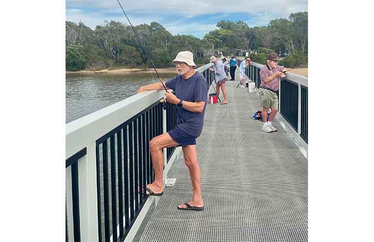 John displays how to relax while fishing.