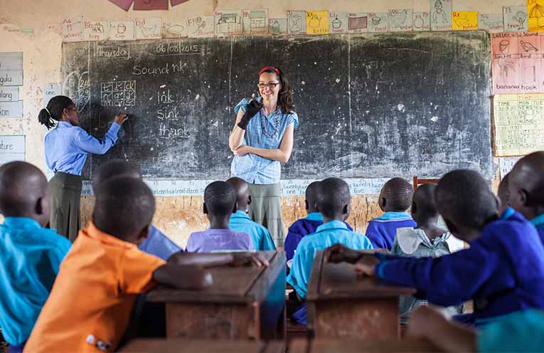 Jody Unterrheiner with classroom teacher Caroline at Layibi Primary School, Gulu, Uganda. Photo: Supplied by READ for Life.