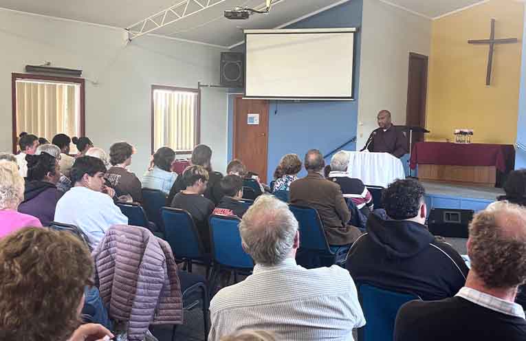 Pastor Eroni Cakakaka leads the service at Nambucca Baptist Church.