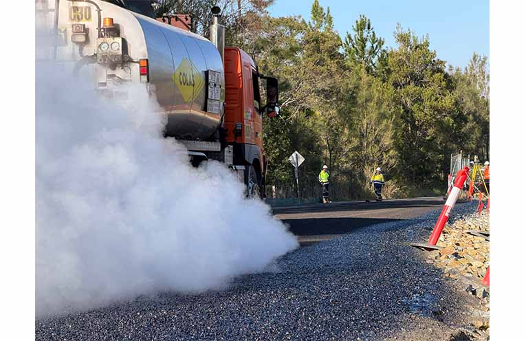 The bitumen sprayer, spraying bitumen emulsion material onto Flame Tree Road, Valla, to effectively complete the landslip remediation works at this site. This is the fifth landslip site across the Nambucca Valley to be remediated so far this year. There are still about 80 more landslip sites to repair across the valley over the next two to three years. Photos: Supplied by NVC.