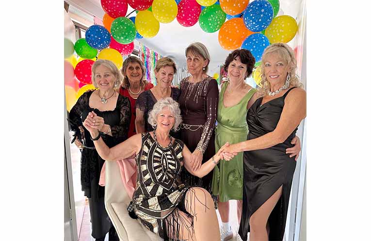 Surrounded by group members, Cheryl Summerville celebrated 10 years of Zumba at Macksville. Photo: Gai McKay.