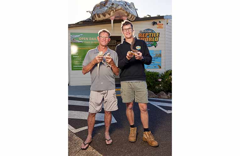 Reptile World Coffs Harbour founder Steve McEwan with his right-hand-man, son Matt.