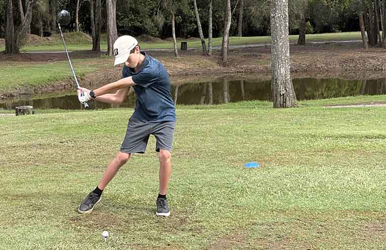 Rising junior star Odin Jolly was like a coiled spring on the third tee. Photo: Supplied.