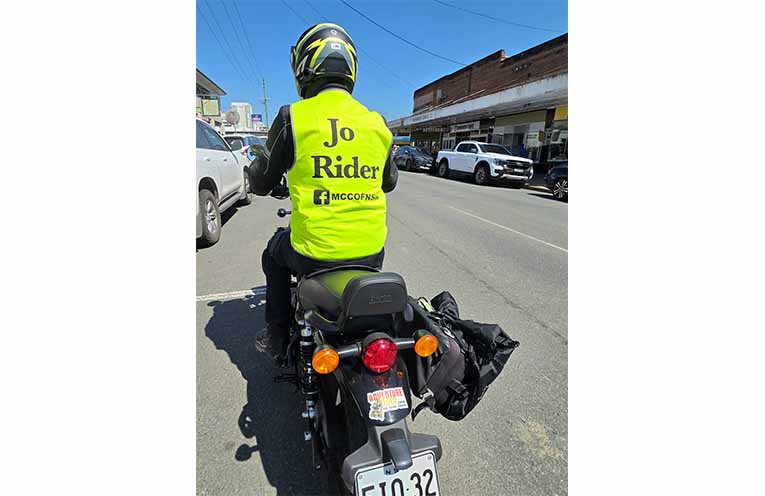 LOOK AGAIN: Brian Beesley in his distinctive Jo Rider vest,encouraging motorists to actively look for motorcycles. Photo: Sonja Duncan.