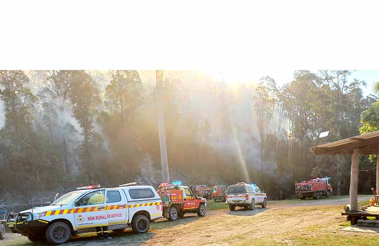 RFS crews oversee containment lines at South Arm. Photo: Leith Garad.