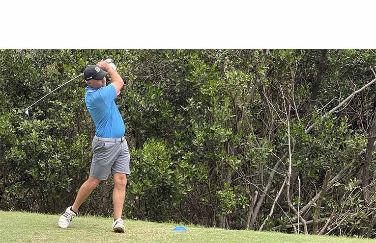 Mick Jolly hits a long laser down the 16th. Photo: Supplied.