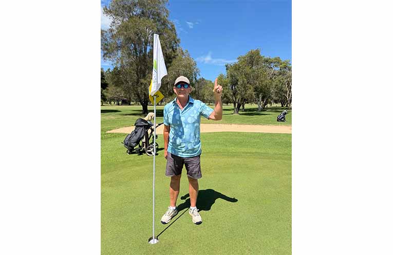 Joey Franck is a gun golfer and is seen here smiling like the Cheshire Cat after a rare hole-in-one on the postage stamp 15th green.