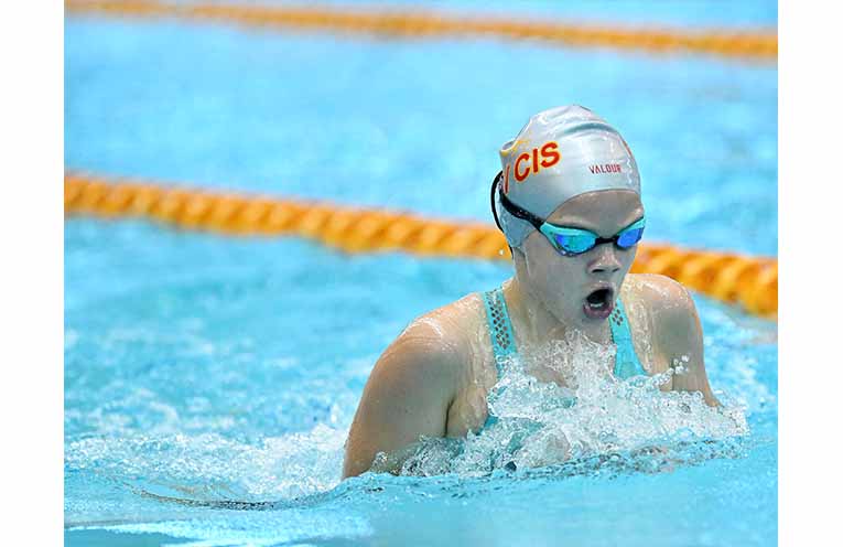 Powering down the pool in a breaststroke event. Photo: Buchholz family.